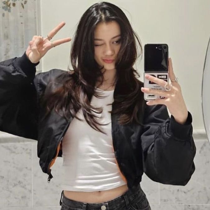 Gương chụp người, người cất lại một khoảnh khắc