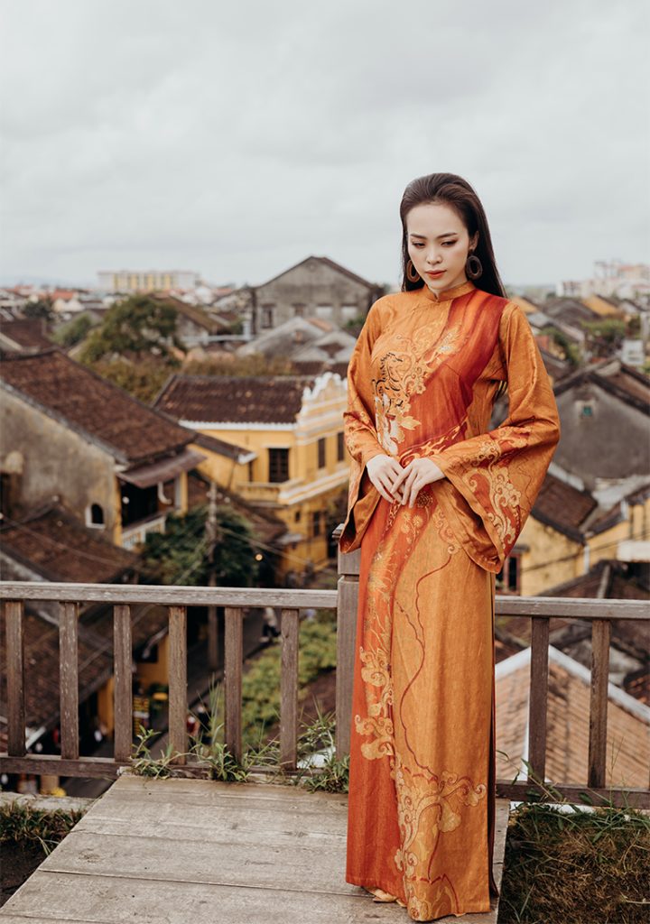 áo dài màu cam tôn dáng tôn da