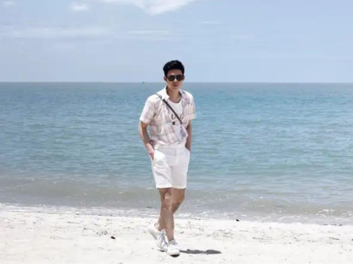 Đây là một trong những kiểu tạo dáng chụp ảnh bãi biển cho nam mà rất nhiều người đang áp dụng