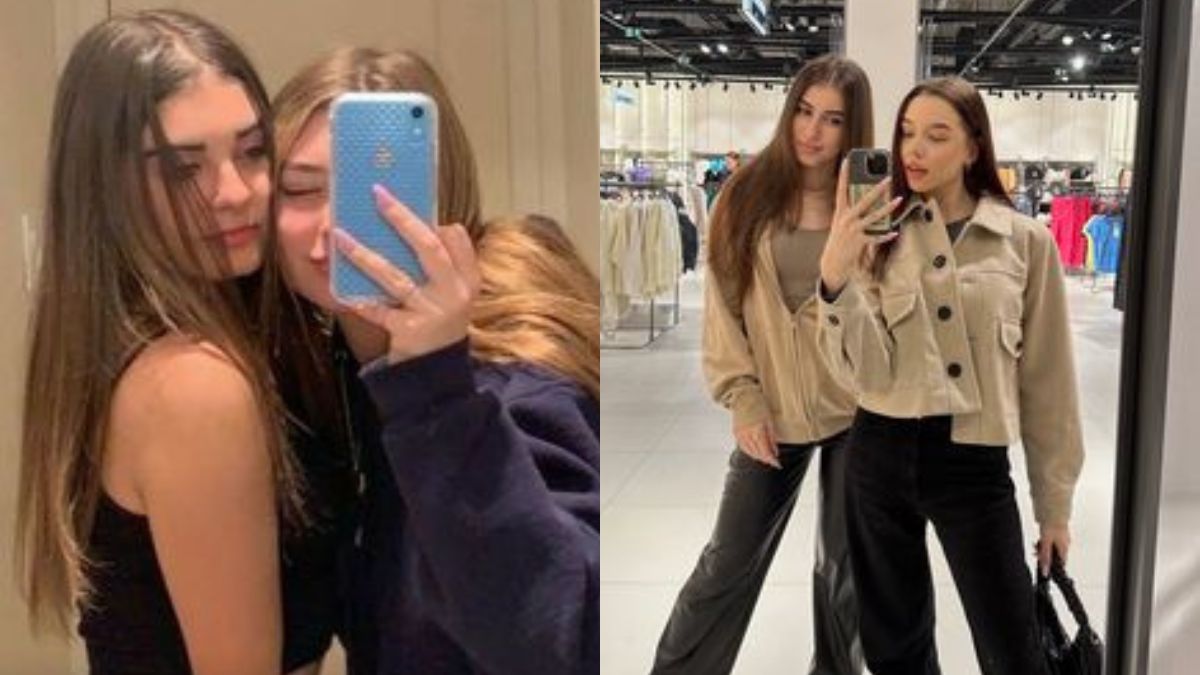 Chụp ảnh trước gương với bạn thân