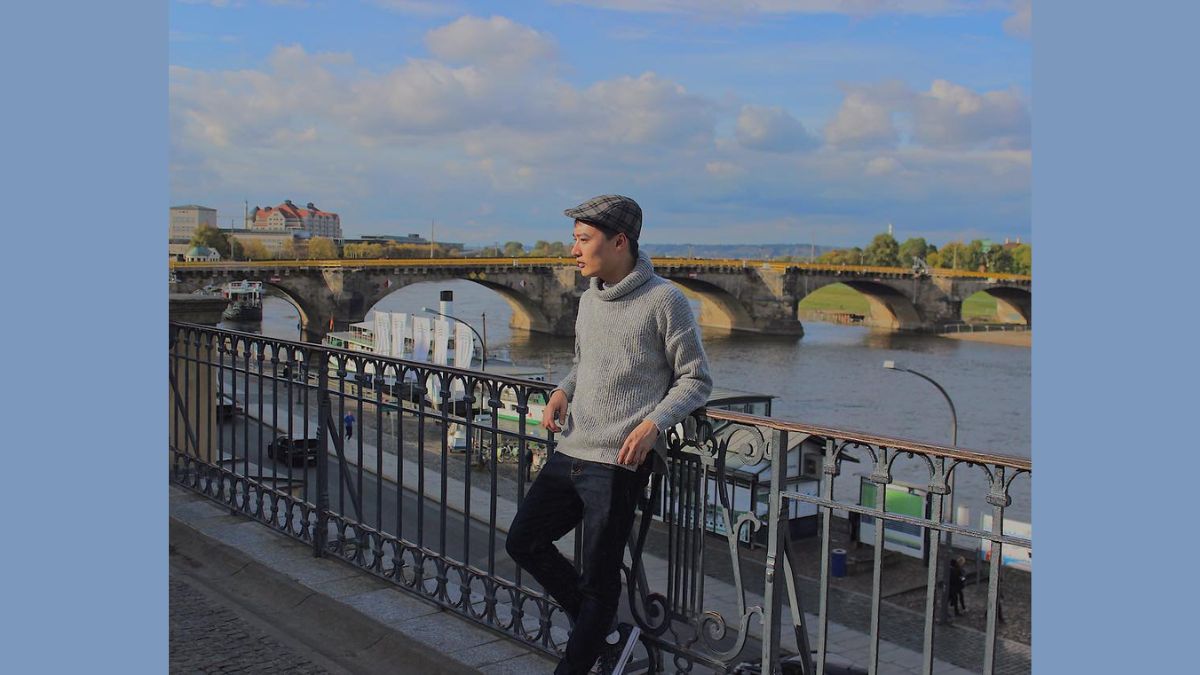 Tạo dáng chụp cho nam giới với lan can