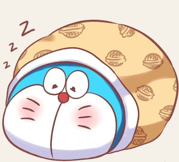 Doraemon ngủ say cuộn tròn trong chiếc chăn mềm