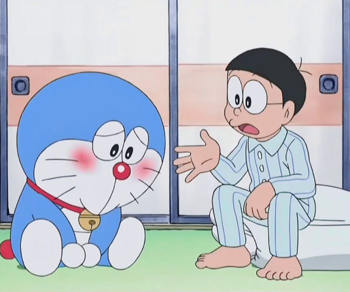 Nobita đang trách Doraemon chuyện gì đó