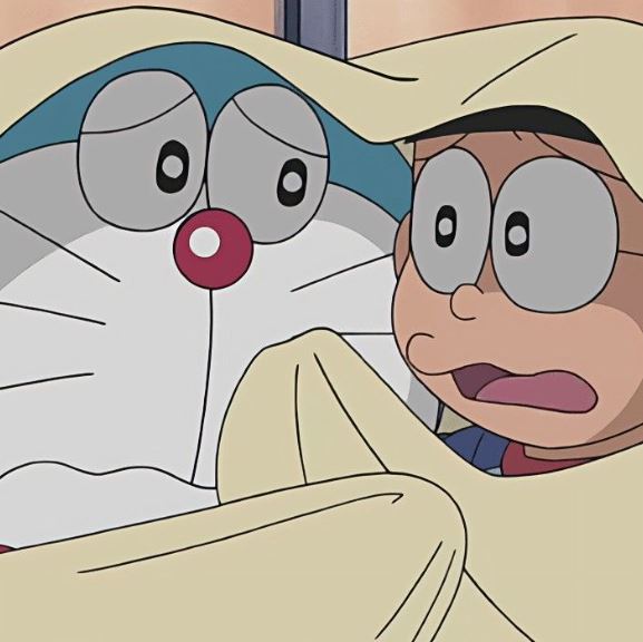 Doraemon và Nobita sợ hãi trong chăn