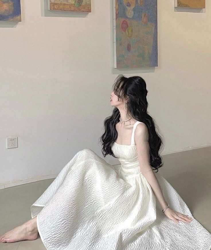 Váy kèm áo len tạo dáng nhẹ nhàng