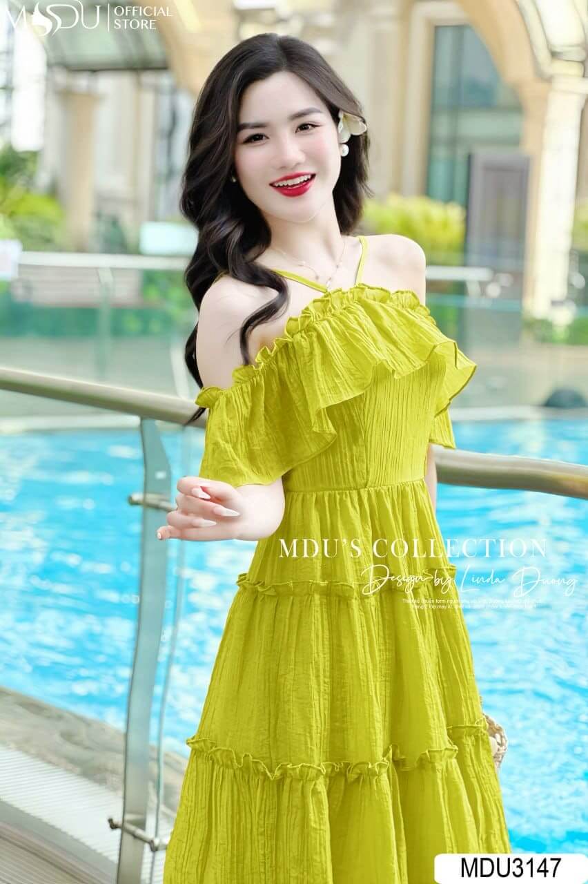 Kết hợp váy đi biển đẹp để nâng tầm bức ảnh