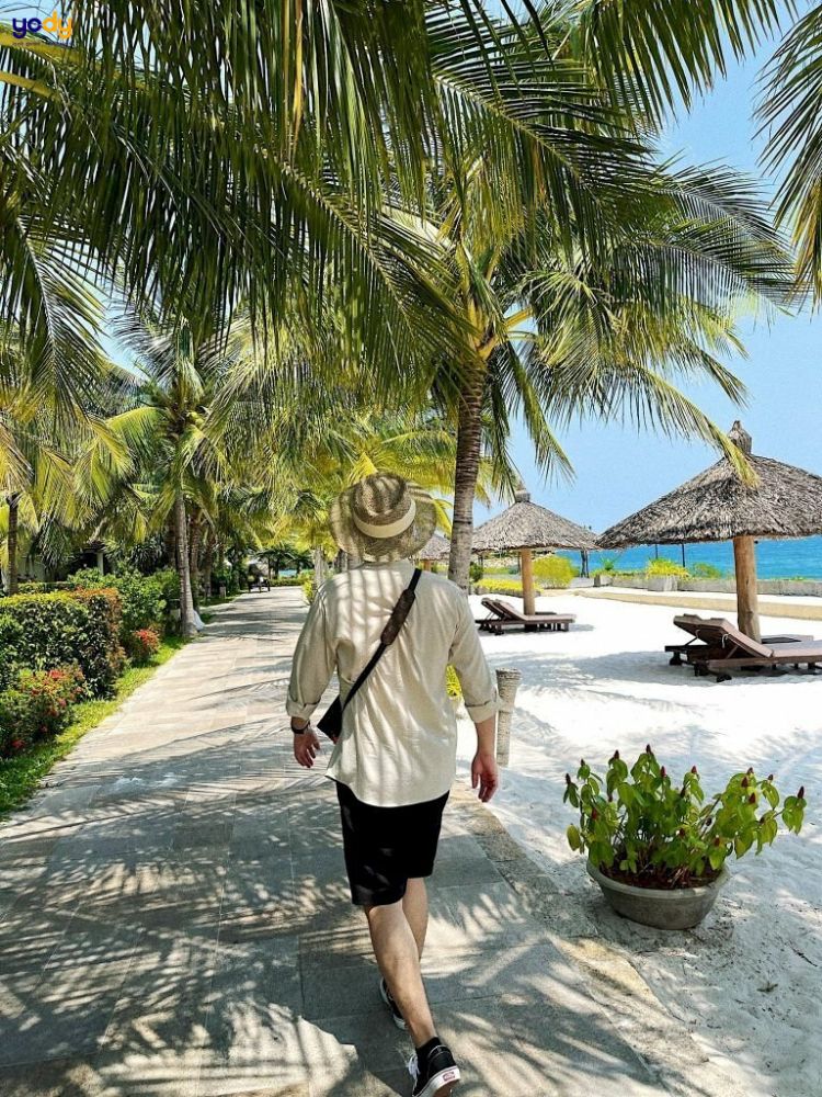 Tạo dáng chụp ảnh bãi biển khi đi dạo