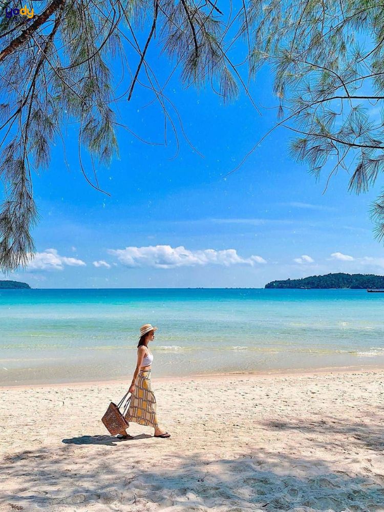 Tạo dáng chụp ảnh bãi biển khi đi dạo