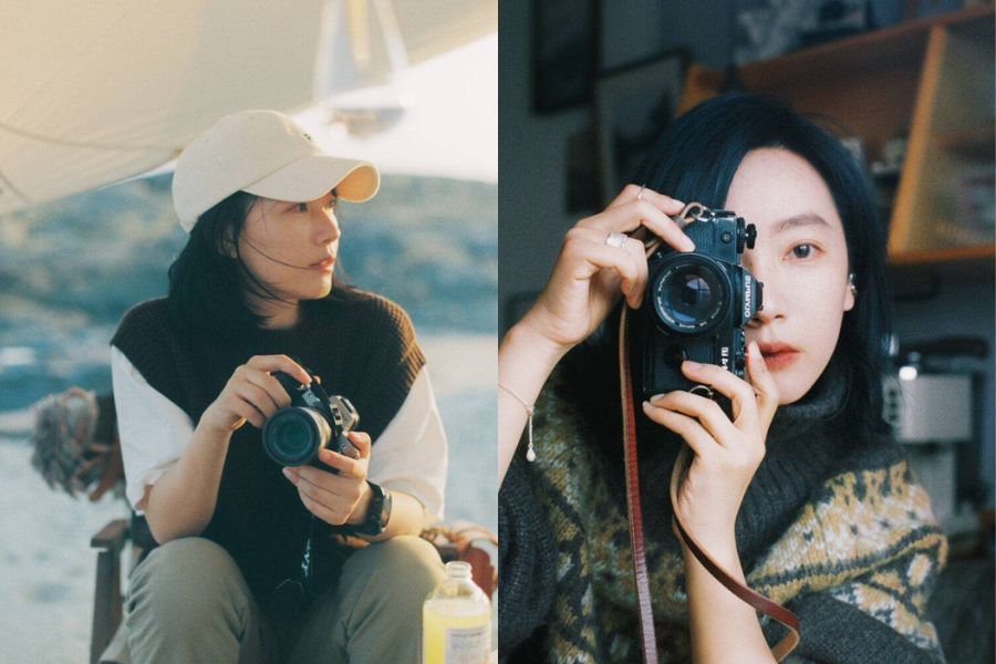 tạo dáng đang giơ máy chụp phong cảnh chùa