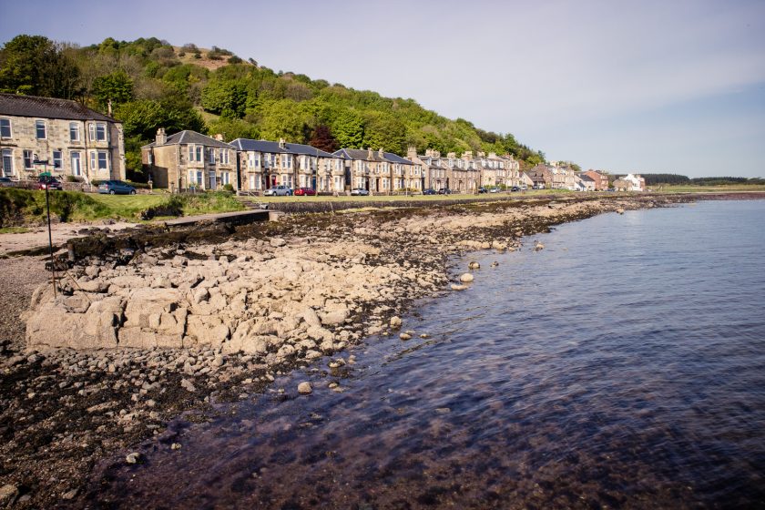 The scenic village of Kilchattan Bay on the Isle of Bute in Scotland