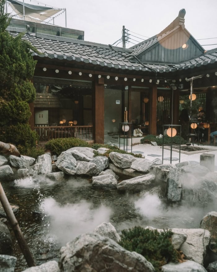 Traditional hanok house restaurant with garden pond