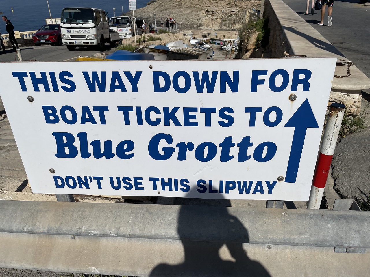 Blue Grotto Malta sign to the boat tickets in blue and white