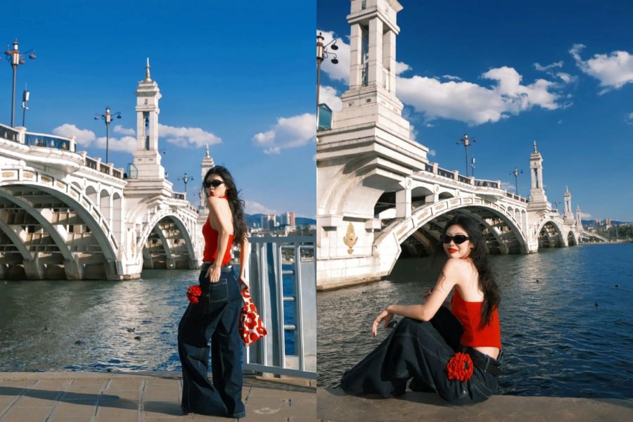 tạo dáng đứng quay lưng đầu xoay nhẹ về phía camera