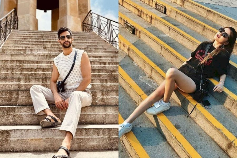 tạo dáng ngồi trên cầu thang