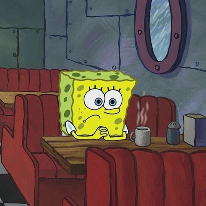Meme buồn SpongeBob ngồi quán cà phê suy tư một mình