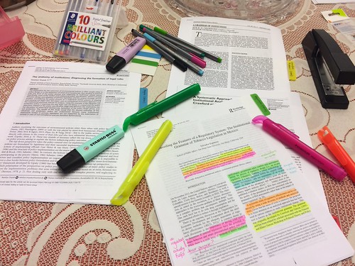 Highlighting, scribbling marginalia, reading, writing