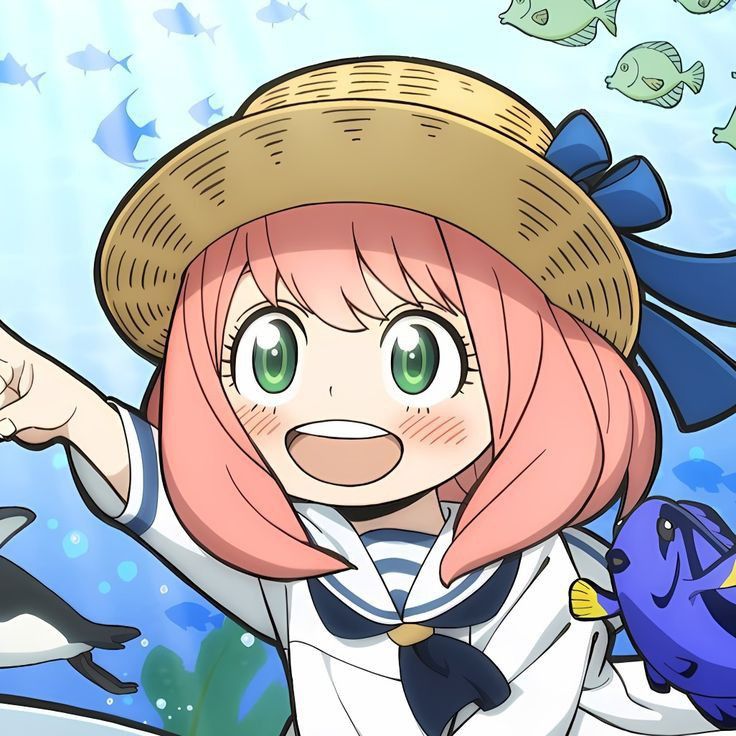 Anya giơ tay cười rạng rỡ thân thiện